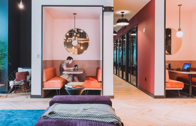 WeWork compte 5 espaces partagés et un immeuble entier à Miami.
