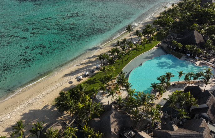 Cet hiver, la villas du Dinarobin, fleuron des resorts Beachcomber, faisaient le plein de familles venues à 6 ou 8 profiter du lagon et du golf.