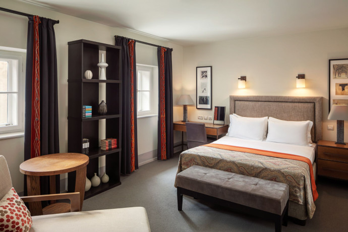 L’une des chambres de l’hôtel Augustine, The Luxury Collection, à Prague.