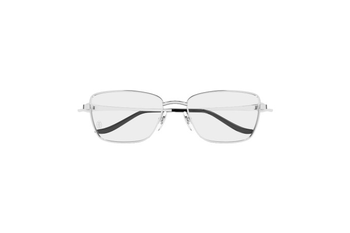 Monture optique œil de chat en métal. Cartier, 970 €.